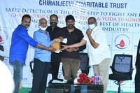 Megastar Distributes Health Cards Photos